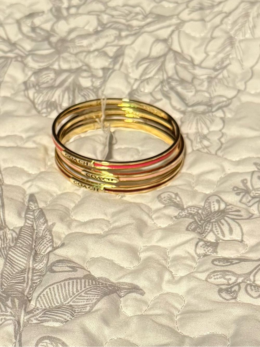 Coach Gold-Tone Bangle Set with Pink Enamel Trim
